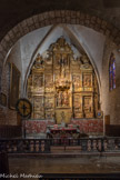 <center>L'abbaye Sainte-Marie-d'Arles-sur-Tech </center>La chapelle des Sts Abdon et Sennen. Retable pré-baroque daté de 1647, œuvre de Lazare Trémullas, premier introducteur en Roussillon du grand retable à panneaux sculptés dorés et polychromés couvrant entièrement le mur du fond de chapelle.