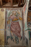 Auron. Chapelle Saint Erige dite d'Ariez <br> Saint Christophe, portant le Christ sur l'épaule, s’appuie sur un palmier et traverse une rivière poissonneuse.